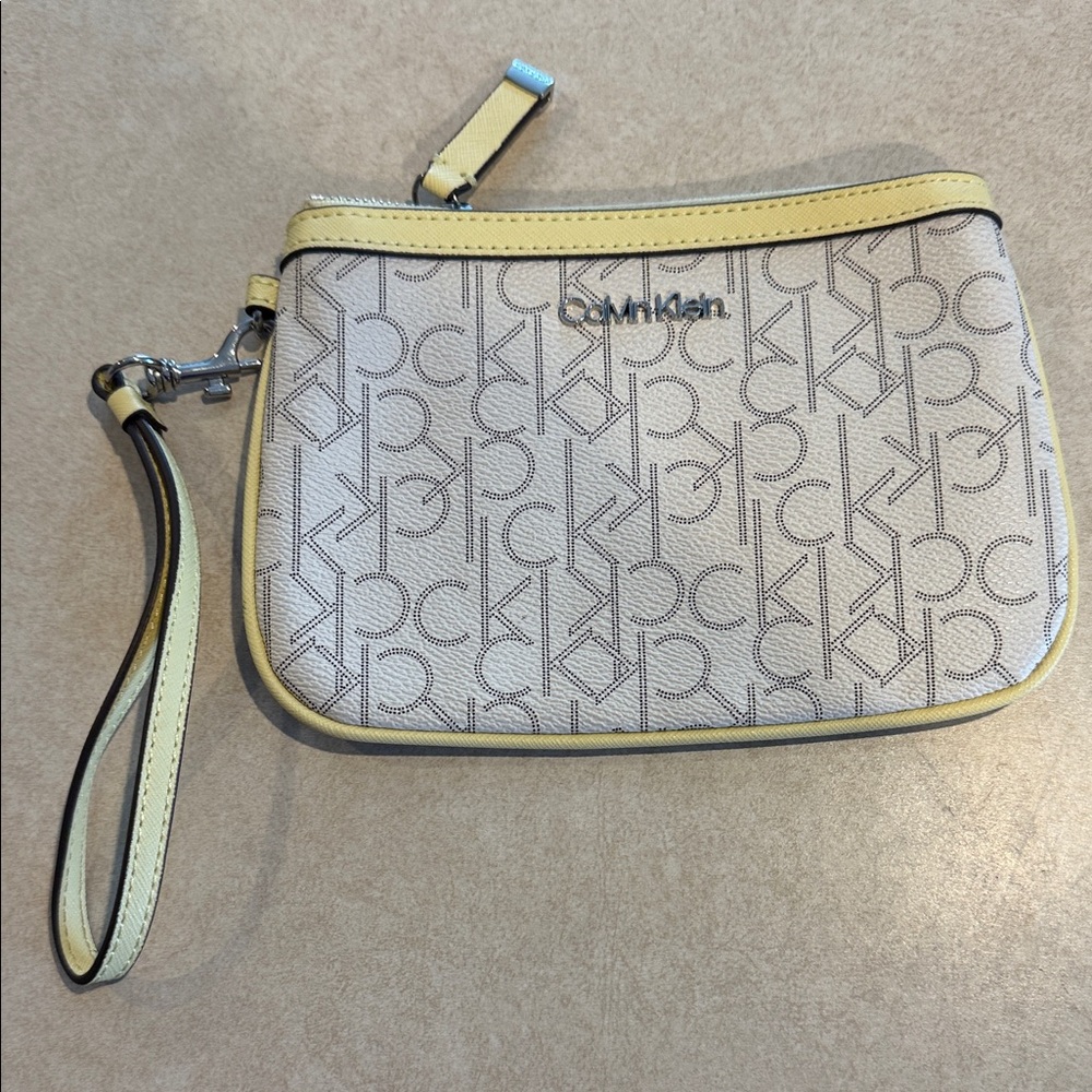 Calvin Klein Cream Monogram Wristlet